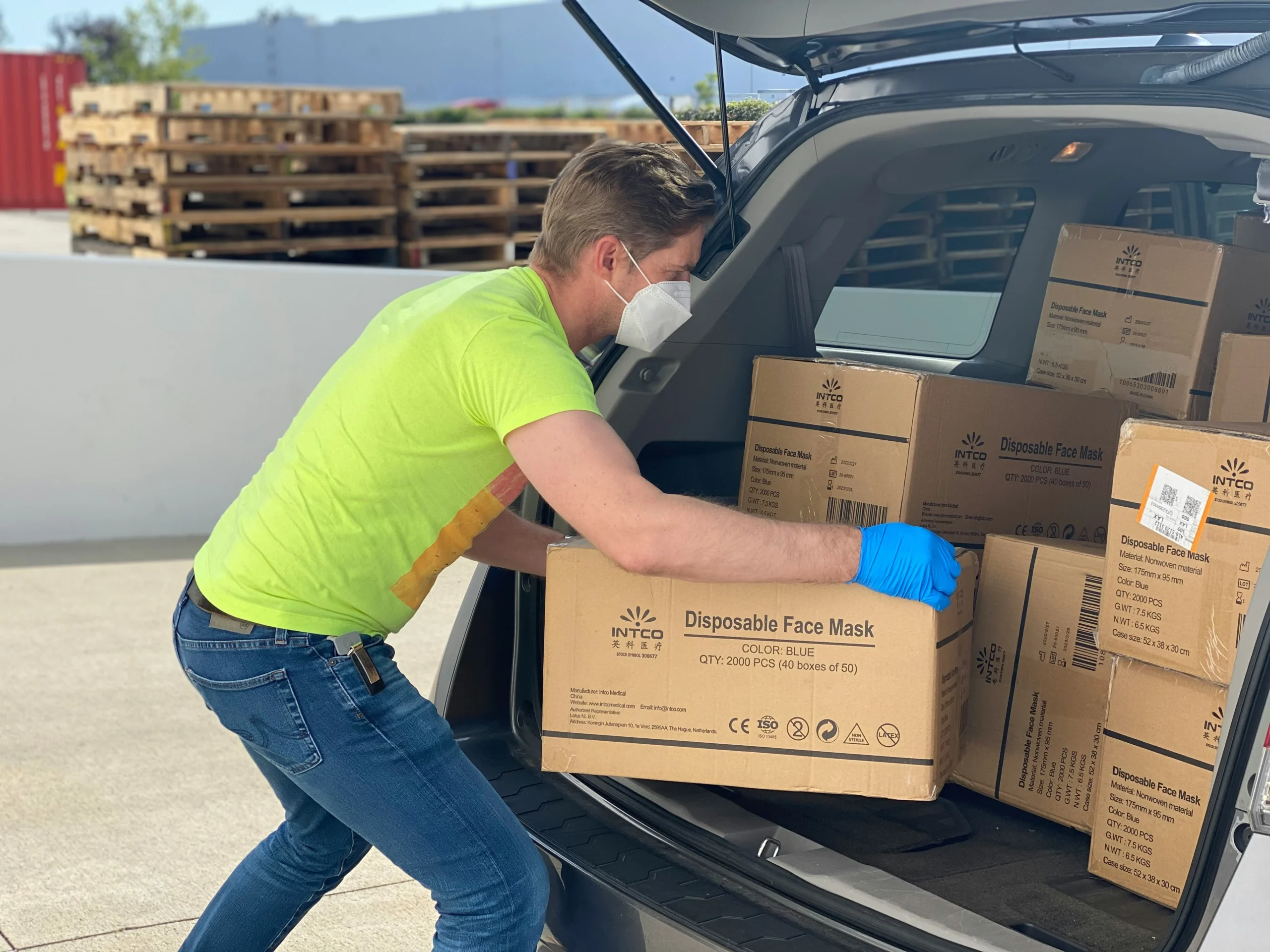 A-person-loading-containers-in-car