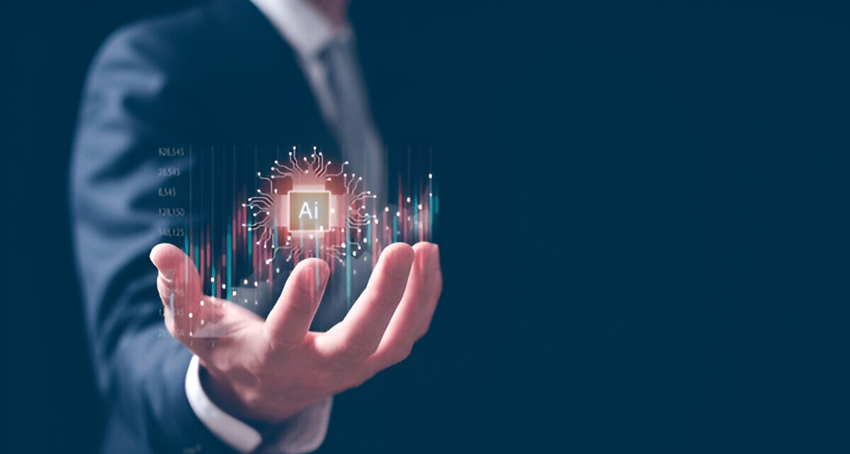 A professional holding a holographic representation of AI, symbolizing the impact of artificial intelligence in predictive maintenance.