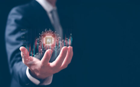 A professional holding a holographic representation of AI, symbolizing the impact of artificial intelligence in predictive maintenance.
