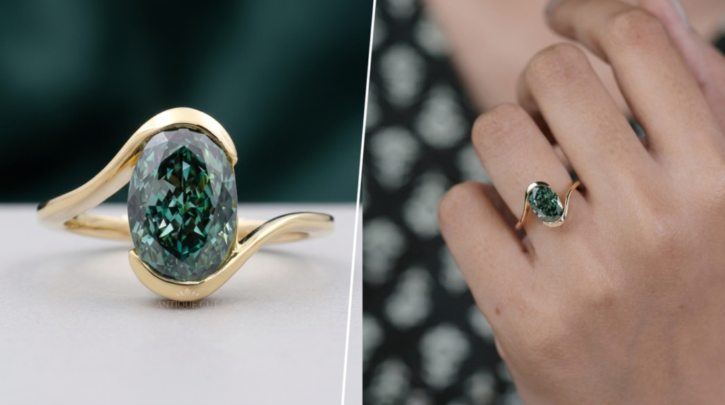 Oval green diamond ring with curved yellow gold band on hand