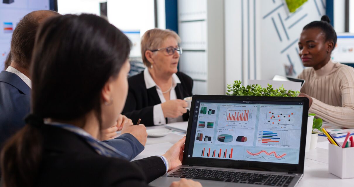 Customer success team reviewing churn prediction scores on a retention dashboard